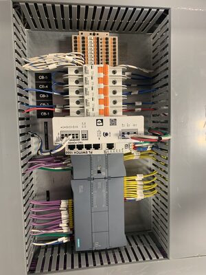 Control panel with a Siemens S7-1200 PLC.